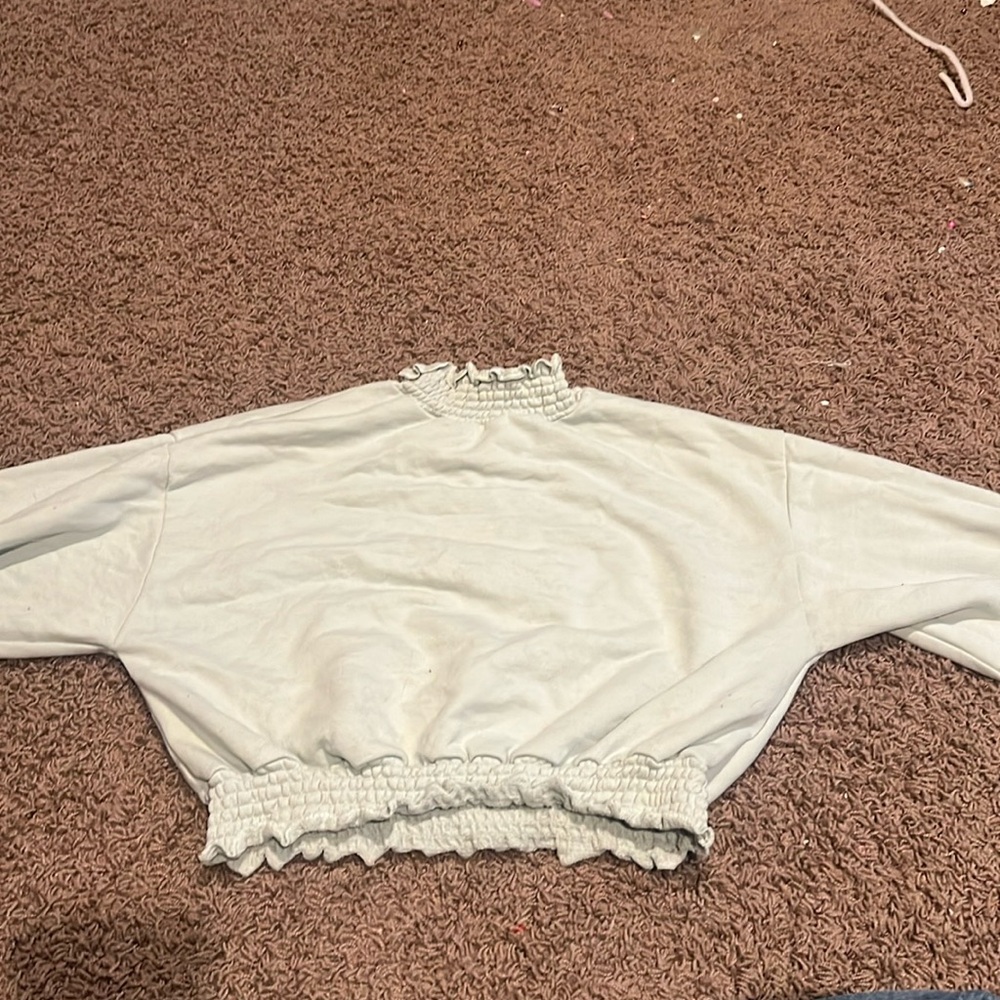 light green turtle neck